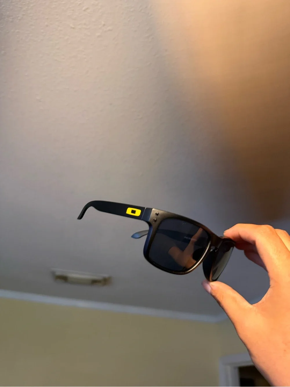 Oakley Matte Black Sunglasses with Yellow Logo Accent Oakleys